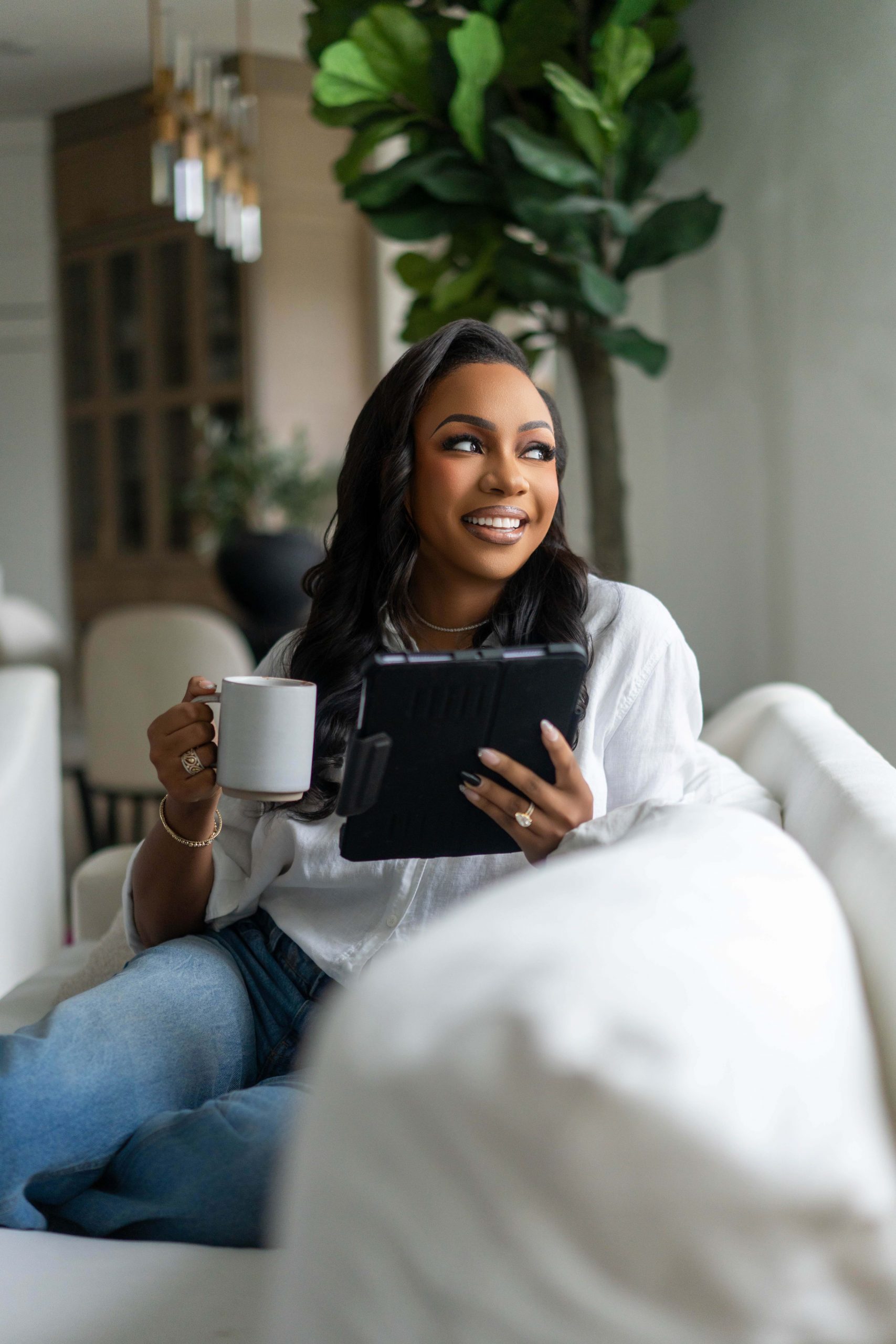 Courtney N. Williams working on an ipad